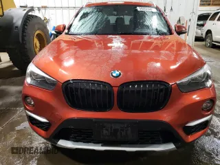 2018 BMW X1 xDrive28i with VIN WBXHT3C37J5L25365, listed as a Copart auction lot 50056365 with 36,200 mi miles and Salvage Title. Bid and sale history available at carsss.com. Image 5.