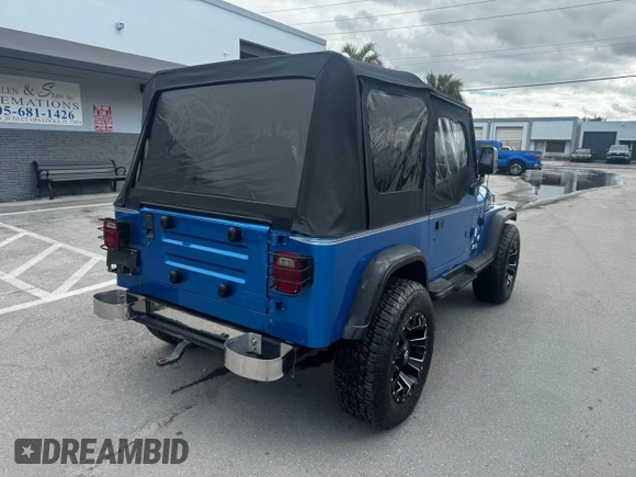 1992 Jeep Wrangler z VIN 2J4FY19P6NJ559597, wystawiony jako Copart lot #81398954 z przebiegiem 150 310 mil mil oraz Szkoda całkowita • Salvage title. Historia ofert i sprzedaży dostępna na DreamBid. Obrazek 4.