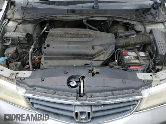 2002 Honda Odyssey EX-L with VIN 2HKRL18902H506828, listed as a Copart auction lot 53735625 with 214,446 mi miles and Salvage title. Bid and sale history available at DreamBid. Image 14.