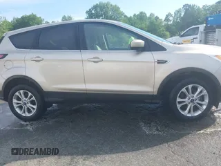 2017 Ford Escape SE with VIN 1FMCU9GD1HUC70823, listed as a IAAI auction lot 41898457 with 86,042 mi miles and . Bid and sale history available at DreamBid. Image 13.
