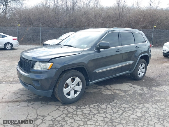 2011 Jeep Grand Cherokee Laredo with VIN 1J4RR4GG7BC721483, listed as a IAAI auction lot 41810180 with 181,558 mi miles. Bid and sale history available at carsss.com. Image 18.