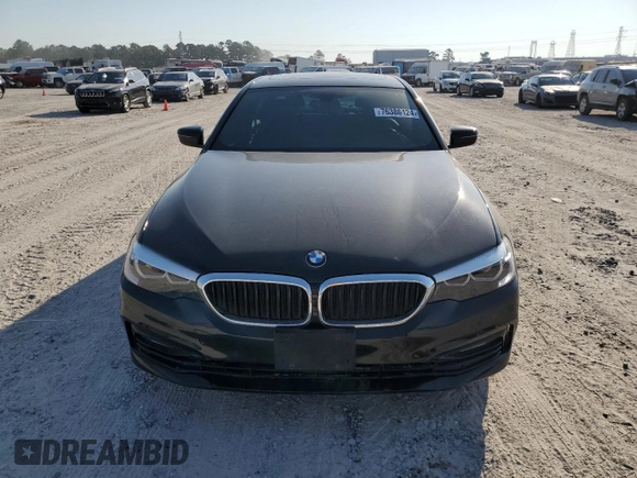 2018 BMW 5 Series 530i with VIN WBAJA5C54JG899845, listed as a Copart auction lot 76386124 with 57,379 mi miles and Salvage Title. Bid and sale history available at DreamBid. Image 5.
