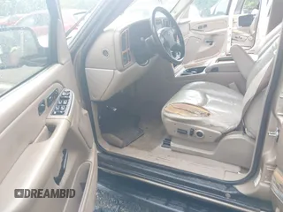 2005 Chevrolet Suburban LT z VIN 1GNFK16Z35J213484, wystawiony jako IAAI lot #42251630 z przebiegiem 384 604 mil mil oraz . Historia ofert i sprzedaży dostępna na DreamBid. Obrazek 5.