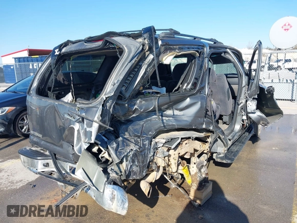 2002 Chevrolet Tahoe LT z VIN 1GNEC13Z42R319646, wystawiony jako IAAI lot #41623259 z przebiegiem 250 430 mil mil oraz . Historia ofert i sprzedaży dostępna na DreamBid. Obrazek 4.