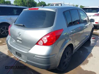 2009 Nissan Versa 1.8 SL with VIN 3N1BC13E19L372298, listed as a IAAI auction lot 42011338 with 131,882 mi miles. Bid and sale history available at carsss.com. Image 4.