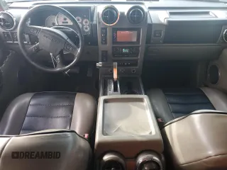2003 Hummer H2 with VIN 5GRGN23U13H147071, listed as a Copart auction lot 82255674 with 272,215 mi miles and Salvage Title. Bid and sale history available at carsss.com. Image 8.