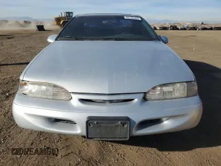 1995 Ford Thunderbird LX with VIN 1FALP62W4SH187234, listed as a Copart auction lot 86122364 with 57,256 mi miles and Clean Title. Bid and sale history available at DreamBid. Image 5.