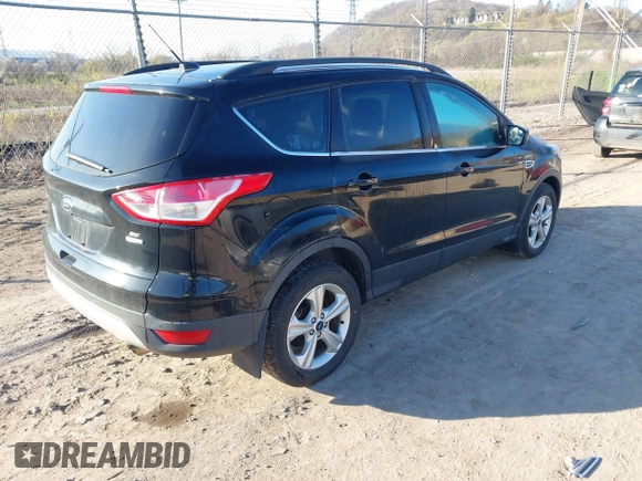 2016 Ford Escape SE with VIN 1FMCU9GX6GUB13846, listed as a IAAI auction lot 42051393 with 108,681 mi miles and . Bid and sale history available at DreamBid. Image 4.
