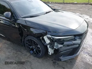 2022 Honda Civic Sport z VIN 2HGFE2F50NH604212, wystawiony jako IAAI lot #42042596 z przebiegiem 40 634 mil mil oraz . Historia ofert i sprzedaży dostępna na DreamBid. Obrazek 6.