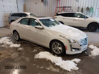 2019 Cadillac CTS Luxury AWD z VIN 1G6AX5SX6K0101573, wystawiony jako IAAI lot #41578522 z przebiegiem 72 702 mil mil oraz . Historia ofert i sprzedaży dostępna na DreamBid. Obrazek 1.