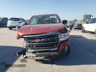 2021 GMC Canyon 4WD AT4 w/Cloth with VIN 1GTG6FEN2M1224875, listed as a Copart auction lot 77651494 with 81,495 mi miles and Salvage Title. Bid and sale history available at carsss.com. Image 5.