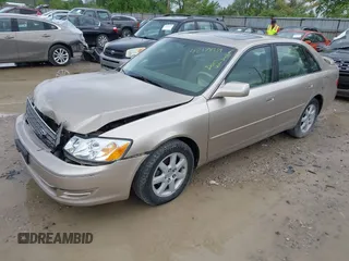 2003 Toyota Avalon XL with VIN 4T1BF28B03U337611, listed as a IAAI auction lot 42178934 with 145,542 mi miles and . Bid and sale history available at DreamBid. Image 2.