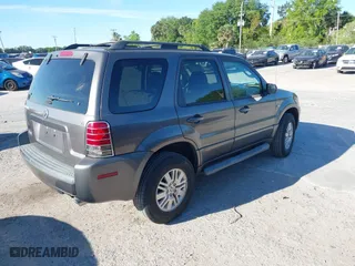 2006 Mercury Mariner Luxury with VIN 4M2YU56156KJ11686, listed as a IAAI auction lot 41854750 with 145,048 mi miles. Bid and sale history available at carsss.com. Image 4.