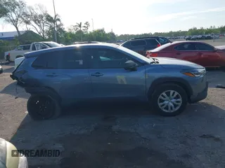 2023 Toyota Corolla Cross L with VIN 7MUAAAAG4PV044969, listed as a IAAI auction lot 42388727 with 26,071 mi miles and . Bid and sale history available at DreamBid. Image 14.