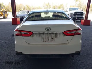 2020 Toyota Camry LE with VIN 4T1C11AK9LU935025, listed as a IAAI auction lot 42054033 with 63,814 mi miles and . Bid and sale history available at carsss.com. Image 16.