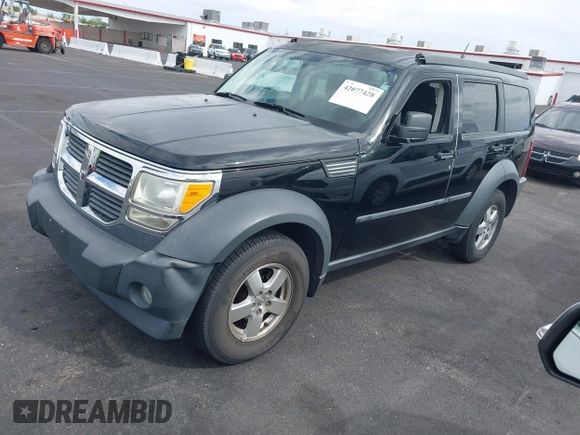 2007 Dodge Nitro SXT with VIN 1D8GT28K27W502900, listed as a IAAI auction lot 42077428 with 166,114 mi miles. Bid and sale history available at carsss.com. Image 2.