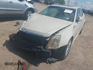 2011 Cadillac CTS Luxury z VIN 1G6DG5EY2B0161125, wystawiony jako IAAI lot #42205213 z przebiegiem 145 775 mil mil oraz . Historia ofert i sprzedaży dostępna na DreamBid. Obrazek 2.