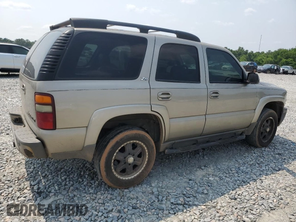2002 Chevrolet Tahoe Z71 z VIN 1GNEK13Z02R269752, wystawiony jako Copart lot #59030705 z przebiegiem 342 433 mil mil oraz Szkoda całkowita • Salvage title. Historia ofert i sprzedaży dostępna na DreamBid. Obrazek 3.