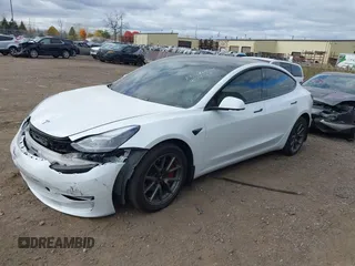 2023 Tesla Model 3 with VIN 5YJ3E1EA1PF384890, listed as a IAAI auction lot 40747791 with Not Provided miles and . Bid and sale history available at carsss.com. Image 2.