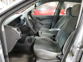 2003 Ford Focus LX z VIN 1FAFP33P03W313279, wystawiony jako Copart lot #89271495 z przebiegiem 152 672 mil mil oraz Szkoda całkowita • Salvage title. Historia ofert i sprzedaży dostępna na DreamBid. Obrazek 7.