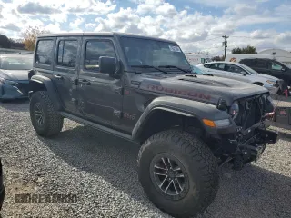 2024 Jeep Wrangler Rubicon X with VIN 1C4RJXFG2RW153197, listed as a Copart auction lot 76521384 with 3,897 mi miles and Salvage title. Bid and sale history available at DreamBid. Image 4.