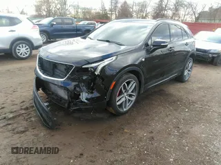 2021 Cadillac XT4 AWD Sport with VIN 1GYFZFR48MF009552, listed as a IAAI auction lot 41743125 with 53,982 mi miles and . Bid and sale history available at DreamBid. Image 2.