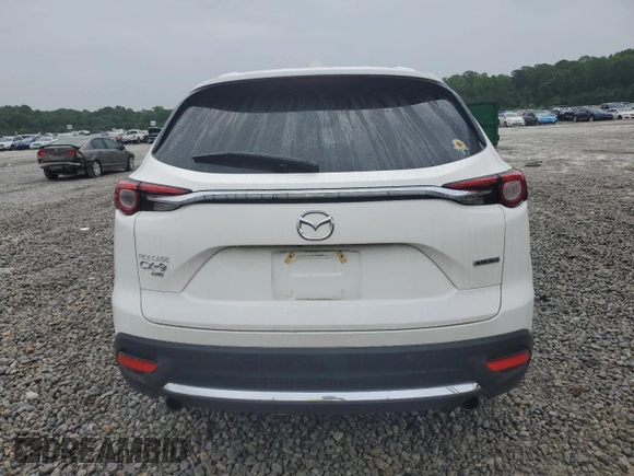 2023 Mazda CX-9 Grand Touring with VIN JM3TCBDY8P0641026, listed as a Copart auction lot 57388665 with 20,033 mi miles and Salvage title. Bid and sale history available at DreamBid. Image 6.