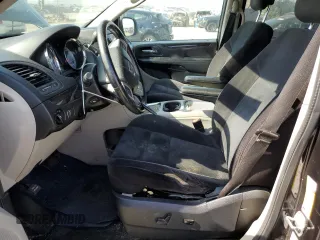 2014 Dodge Grand Caravan SXT z VIN 2C4RDGCG0ER321403, wystawiony jako Copart lot #55204635 z przebiegiem 219 510 mil mil oraz Tytuł czysty. Historia ofert i sprzedaży dostępna na DreamBid. Obrazek 7.