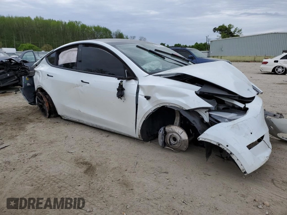 2021 Tesla Model Y Standard Range z VIN 5YJYGDED1MF109091, wystawiony jako Copart lot #50414004 z przebiegiem Nie podano mil oraz Szkody całkowita. Historia ofert i sprzedaży dostępna na DreamBid. Obrazek 4.