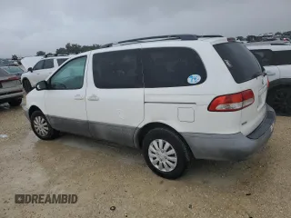 2001 Toyota Sienna LE with VIN 4T3ZF13C21U369506, listed as a Copart auction lot 74561634 with 0 mi miles and Salvage Title. Bid and sale history available at carsss.com. Image 2.