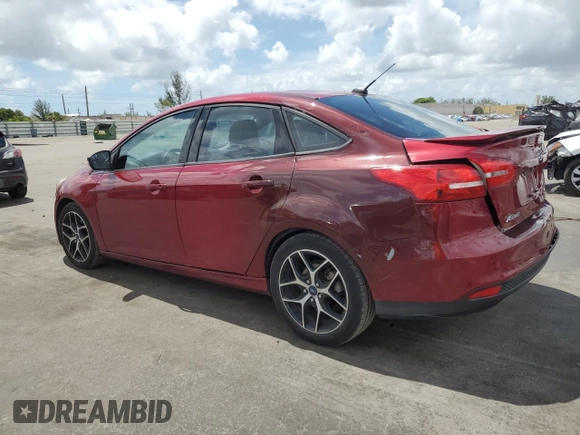 2015 Ford Focus SE z VIN 1FADP3F24FL332883, wystawiony jako Copart lot #64429655 z przebiegiem 65 939 mil mil oraz Szkoda całkowita • Salvage title. Historia ofert i sprzedaży dostępna na DreamBid. Obrazek 2.