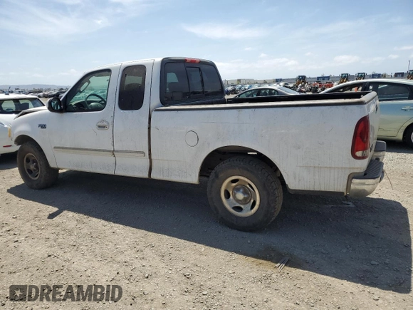 2003 Ford F-150 XL with VIN 2FTRX17213CA05950, listed as a Copart auction lot 54435115 with 310,503 mi miles and Salvage title. Bid and sale history available at DreamBid. Image 2.