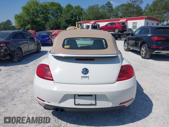 2013 Volkswagen Beetle 2.5L with VIN 3VW5P7AT3DM811617, listed as a IAAI auction lot 42055769 with 93,810 mi miles and . Bid and sale history available at DreamBid. Image 16.