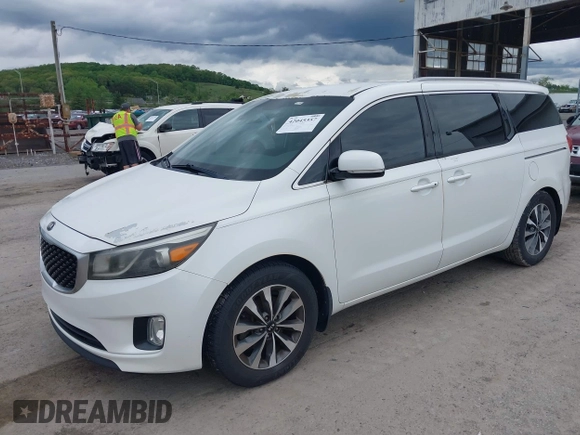 2015 Kia Sedona EX with VIN KNDMC5C14F6019067, listed as a IAAI auction lot 42045357 with 149,736 mi miles. Bid and sale history available at carsss.com. Image 2.