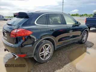 2013 Porsche Cayenne S Hybrid с VIN WP1AE2A20DLA14095, выставлен на аукционе Copart как лот 64215625 с пробегом 148 286 миль миль и Списание • Salvage title. История ставок и продаж доступна на DreamBid. Изображение 3.