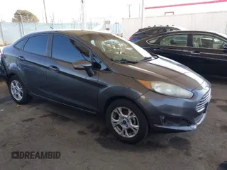 2016 Ford Fiesta SE z VIN 3FADP4BJ6GM139279, wystawiony jako IAAI lot #41991387 z przebiegiem 59 845 mil mil oraz . Historia ofert i sprzedaży dostępna na DreamBid. Obrazek 1.