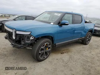 2023 Rivian R1T Launch Edition with VIN 7FCTGAAL7PN019188, listed as a Copart auction lot 55100405 with 13,654 mi miles and Salvage Title. Bid and sale history available at DreamBid. Image 1.