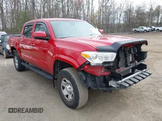 2022 Toyota Tacoma SR with VIN 3TYCZ5ANXNT076537, listed as a IAAI auction lot 41897808 with 51,407 mi miles and . Bid and sale history available at DreamBid. Image 1.