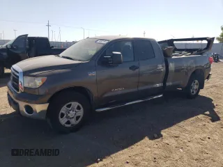 2010 Toyota Tundra 4WD Truck with VIN 5TFCY5F18AX009492, listed as a Copart auction lot 74092164 with 210,981 mi miles and Clean Title. Bid and sale history available at carsss.com. Image 1.