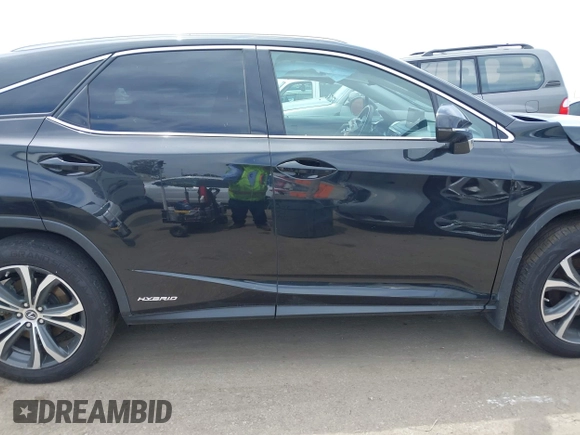 2022 Lexus RX 450h z VIN 2T2HGMDAXNC090694, wystawiony jako IAAI lot #42238399 z przebiegiem 58 272 mil mil oraz . Historia ofert i sprzedaży dostępna na DreamBid. Obrazek 13.
