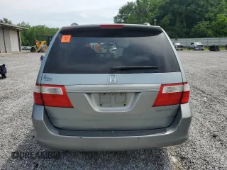 2005 Honda Odyssey EX-L with VIN 5FNRL38765B088756, listed as a Copart auction lot 57071365 with 243,277 mi miles and Salvage title. Bid and sale history available at DreamBid. Image 6.