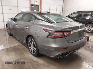 2020 Nissan Maxima SL with VIN 1N4AA6DV2LC377576, listed as a IAAI auction lot 41292362 with 79,921 mi miles and . Bid and sale history available at DreamBid. Image 3.