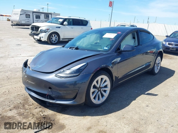 2023 Tesla Model 3 with VIN 5YJ3E1EAXPF617388, listed as a IAAI auction lot 42218748 with Not provided miles and . Bid and sale history available at DreamBid. Image 2.
