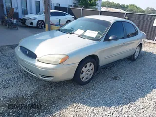 2005 Ford Taurus SE with VIN 1FAFP53205A131307, listed as a IAAI auction lot 42678385 with 198,491 mi miles and . Bid and sale history available at DreamBid. Image 2.