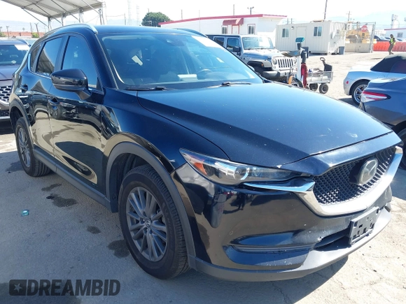 2019 Mazda CX-5 Sport with VIN JM3KFABM7K1579747, listed as a IAAI auction lot 41965097 with 151,042 mi miles and . Bid and sale history available at DreamBid. Image 1.