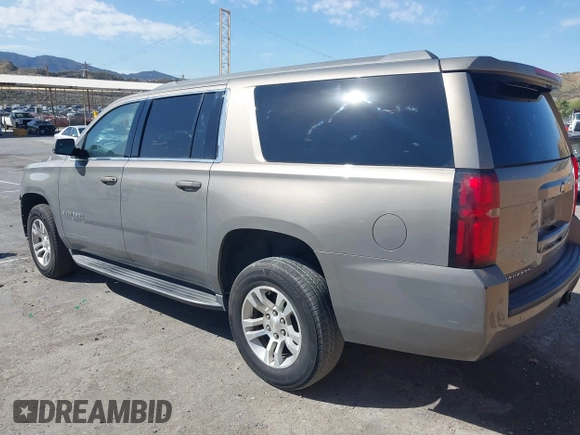 2017 Chevrolet Suburban LS with VIN 1GNSCGEC9HR355405, listed as a IAAI auction lot 41674594 with 170,312 mi miles and . Bid and sale history available at DreamBid. Image 3.