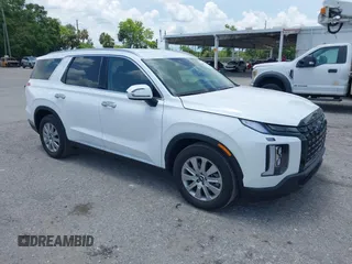 2024 Hyundai Palisade SEL z VIN KM8R24GE3RU779664, wystawiony jako IAAI lot #42551727 z przebiegiem 5 614 mil mil oraz . Historia ofert i sprzedaży dostępna na DreamBid. Obrazek 1.