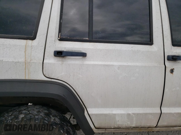 1992 Jeep Cherokee SE with VIN 1J4FJ28S1NL154354, listed as a Copart auction lot 71081634 with 0 mi miles and Salvage Title. Bid and sale history available at carsss.com. Image 11.