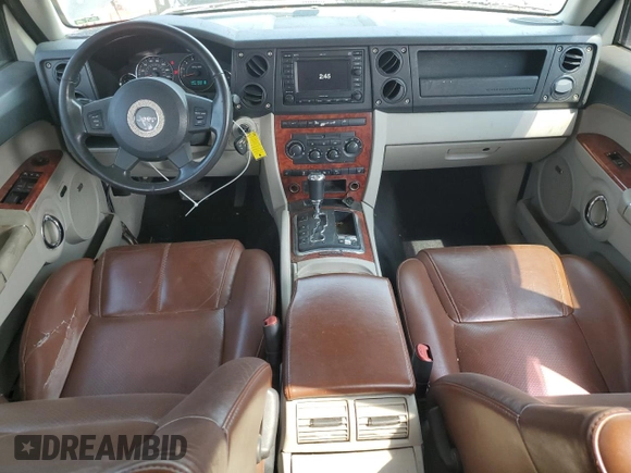 2007 Jeep Commander Limited z VIN 1J8HG58P27C520330, wystawiony jako Copart lot #54595745 z przebiegiem 168 908 mil mil oraz Szkoda całkowita • Salvage title. Historia ofert i sprzedaży dostępna na DreamBid. Obrazek 8.