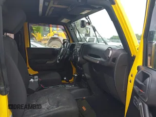2015 Jeep Wrangler Freedom Edition with VIN 1C4AJWAG1FL652522, listed as a IAAI auction lot 42592232 with Not provided miles and . Bid and sale history available at DreamBid. Image 5.